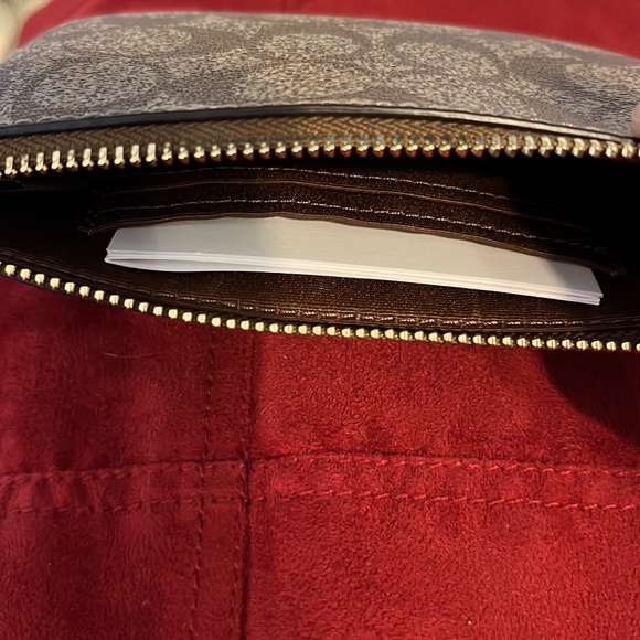 NWT Coach corner zip wristlet in signature canvas. - Picture 3 of 3